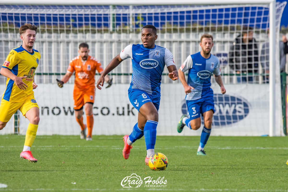 Jordan Ngalo evades Alfie Stanley_AFC Totton vs Dorchester Town_FATrQR3_30Oct21.jpg