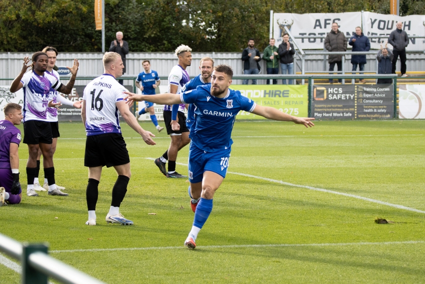 Lee wheeling away in celebration.jpg