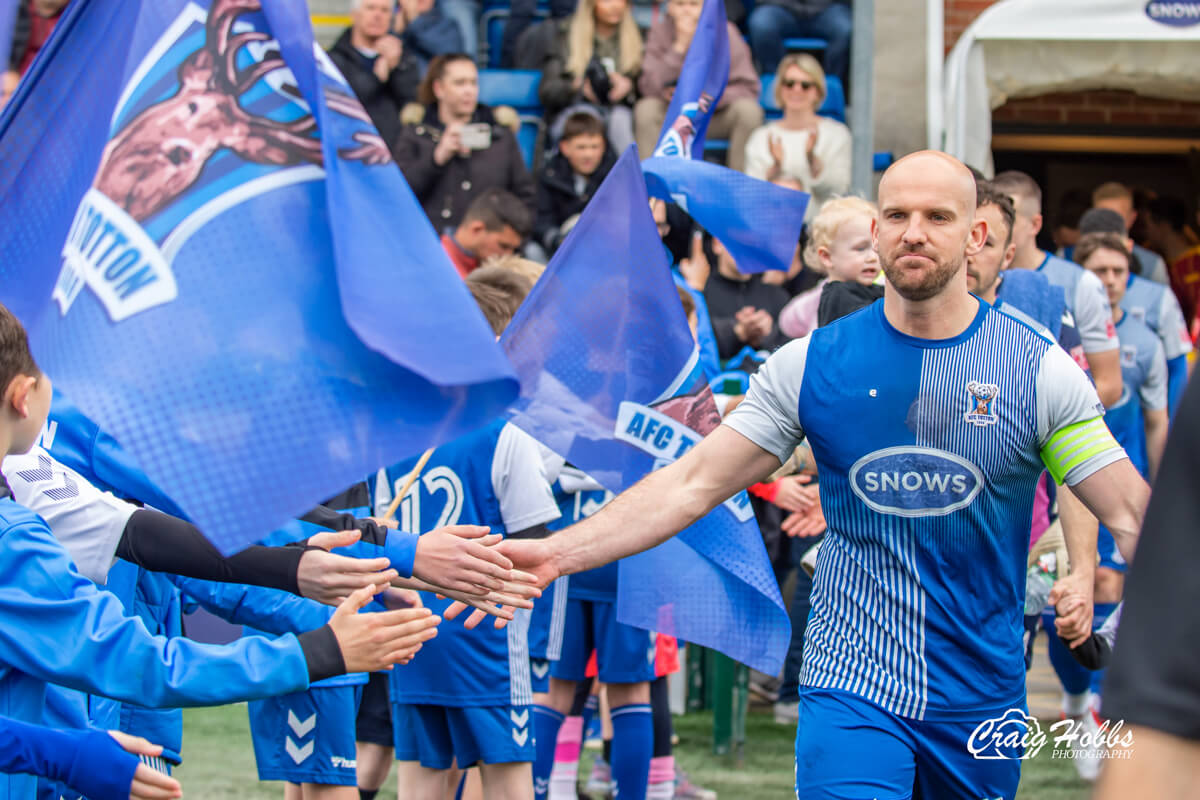 Mike Carter_Walk-Out_AFC Totton vs Exmouth Town_SLD1S-36_Sat15Apr2023.jpg