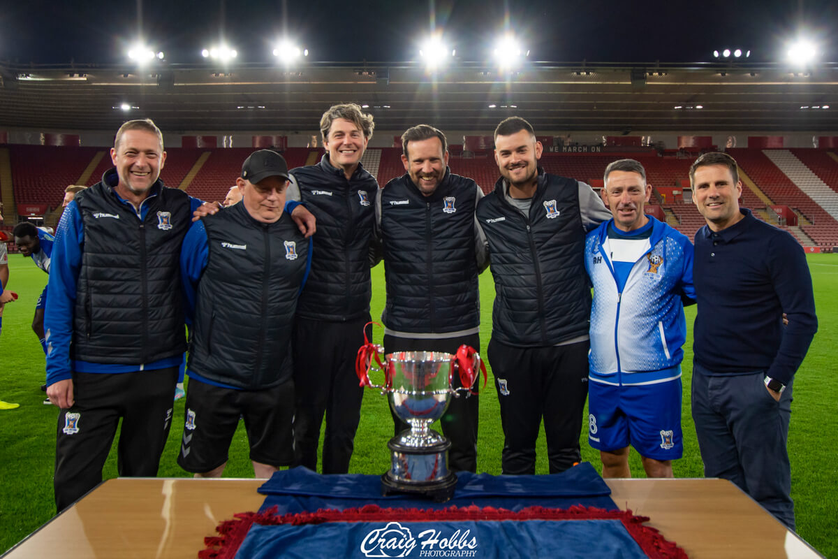 AFC Totton Back Room Staff-2_Southampton Senior Cup Winners 2022_Post-Match Celebrations_AFC Totton vs Folland Sports_St Marys Stadium_SSC Final_Thu05May2022.jpg