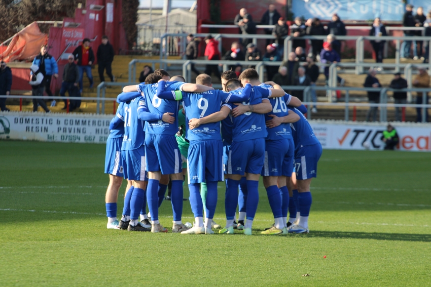 Squad huddle at Ebbsfleet.JPG